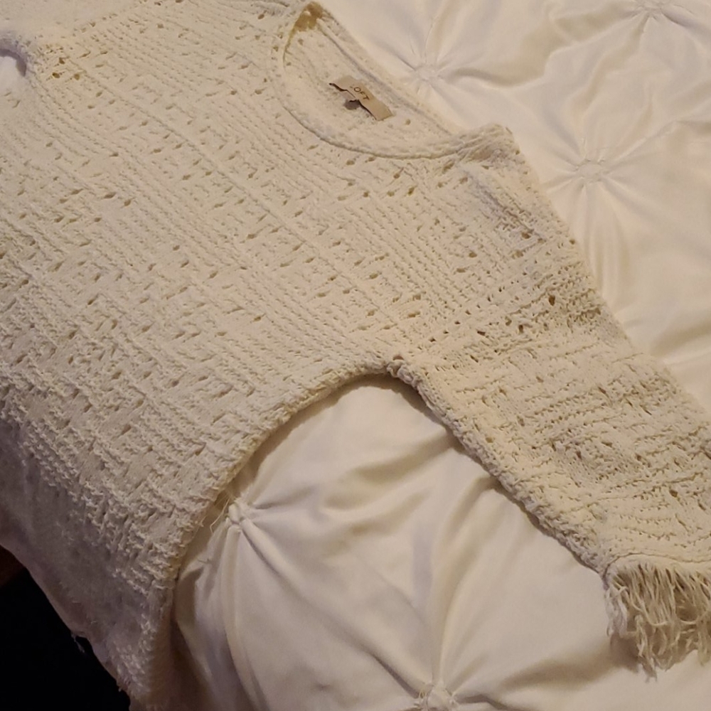 Frayed hem sweater